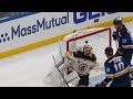 Charlie McAvoy bats the puck off the goal line to keep the Blues off the board